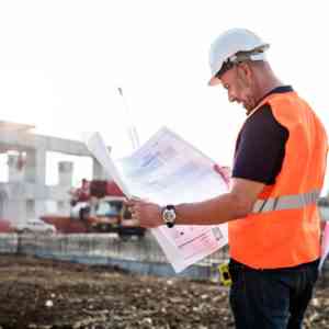 architect in a building construction site