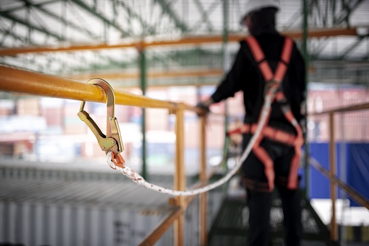 Worker Harnessed on Scaffolding